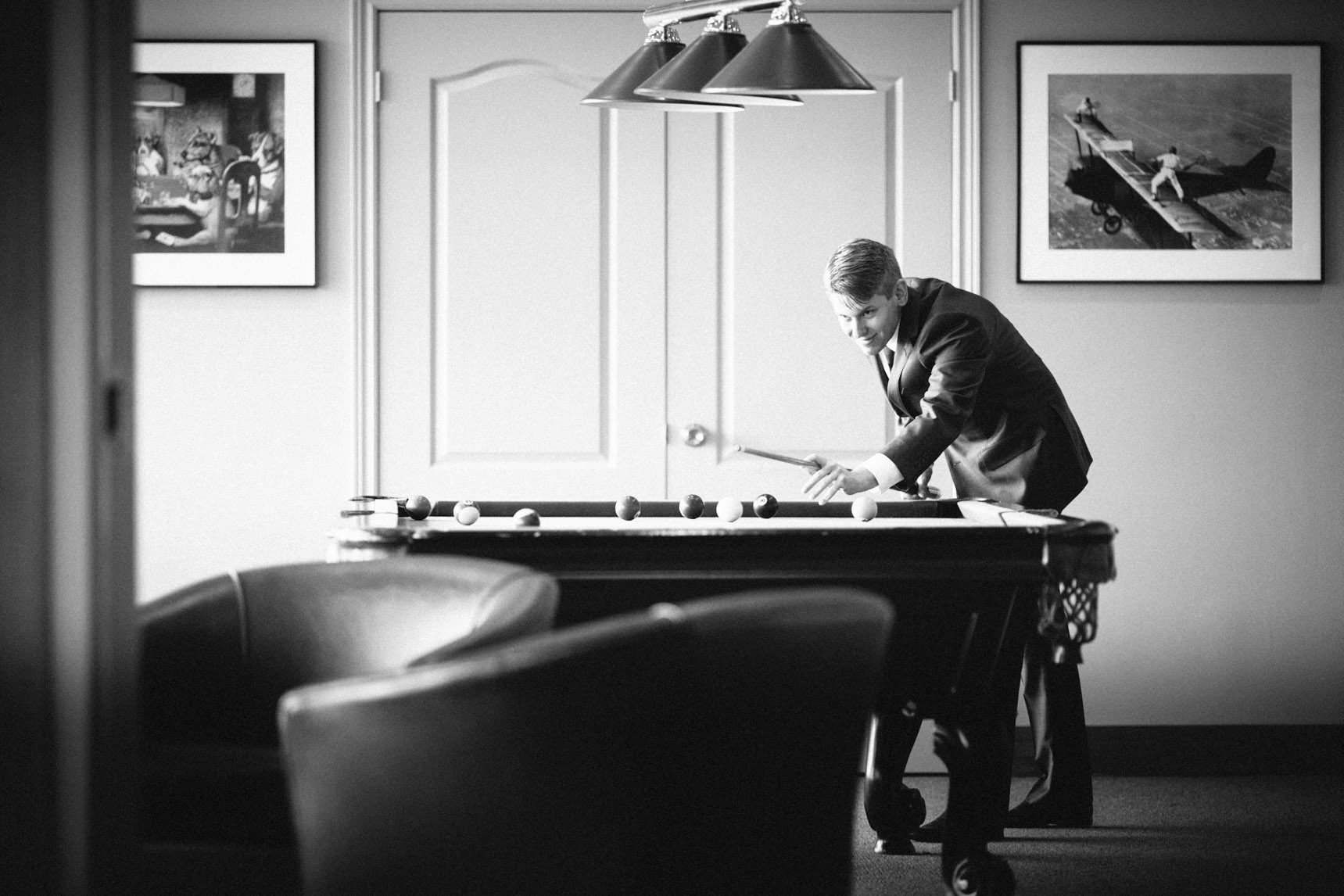 Guests play pool at the Kingbridge centre wedding.