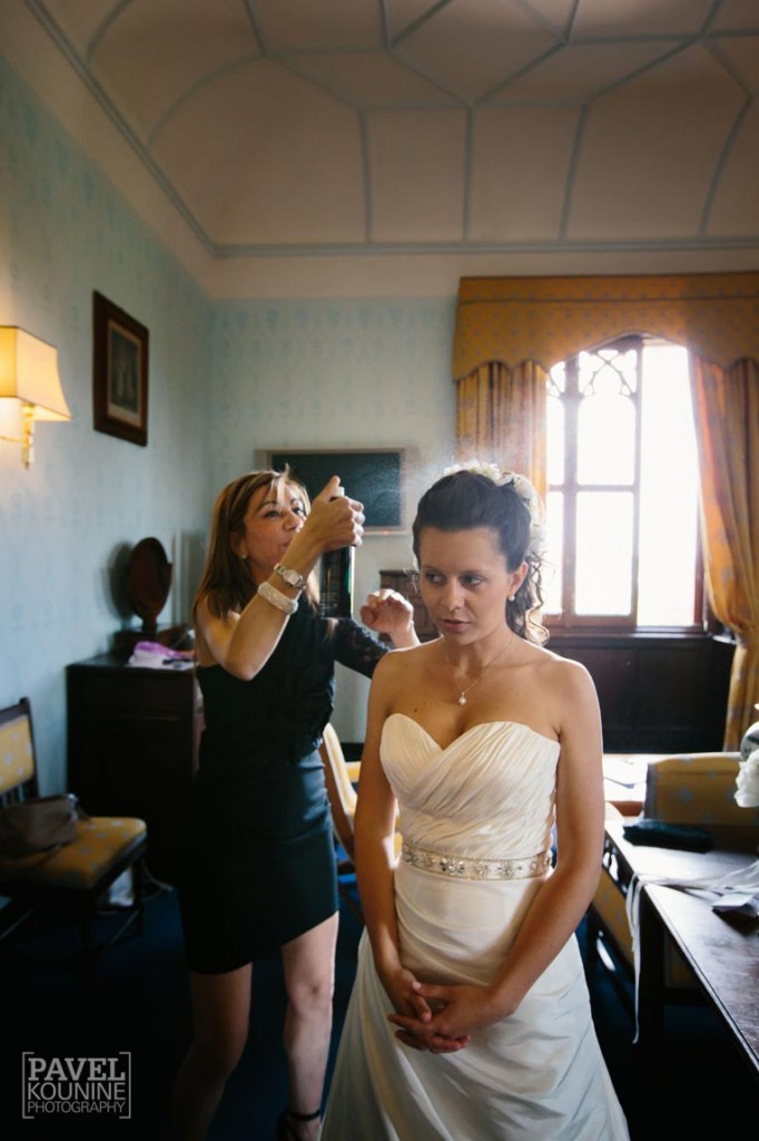 Intimate wedding photography: backlit hairspray photo with bride