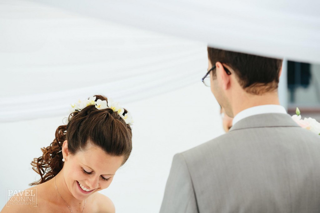 Intimate wedding photography: bride laughs