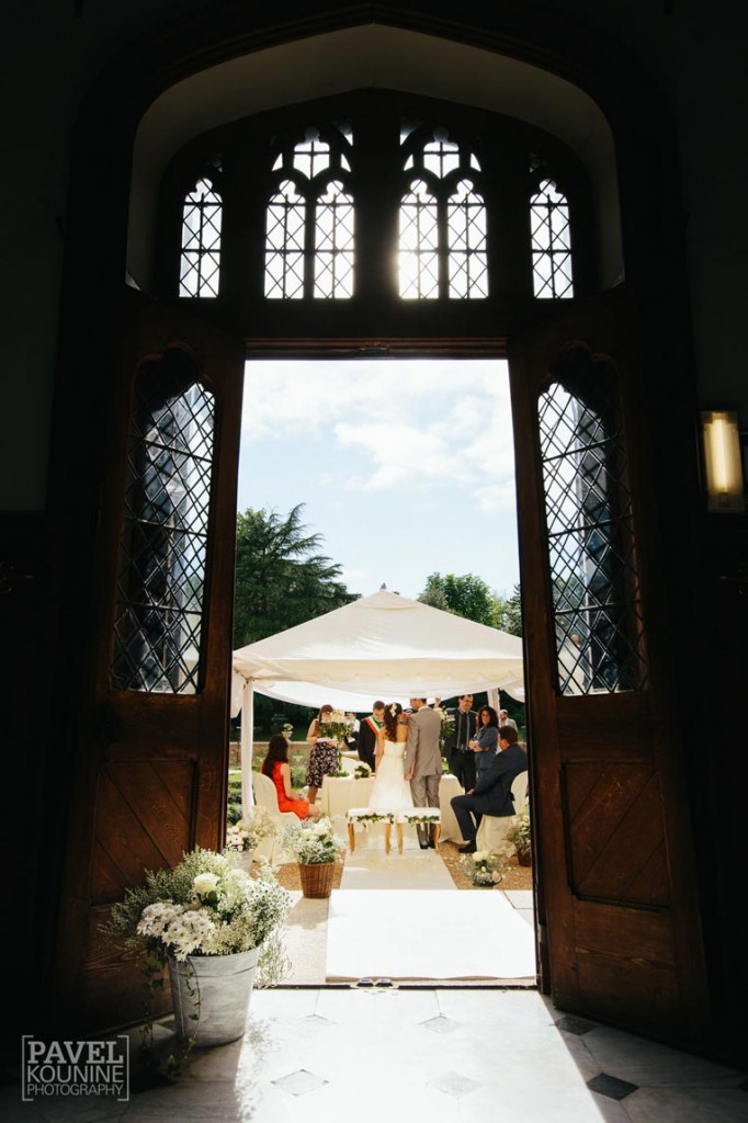 Intimate wedding photography: bride and groom under canopy