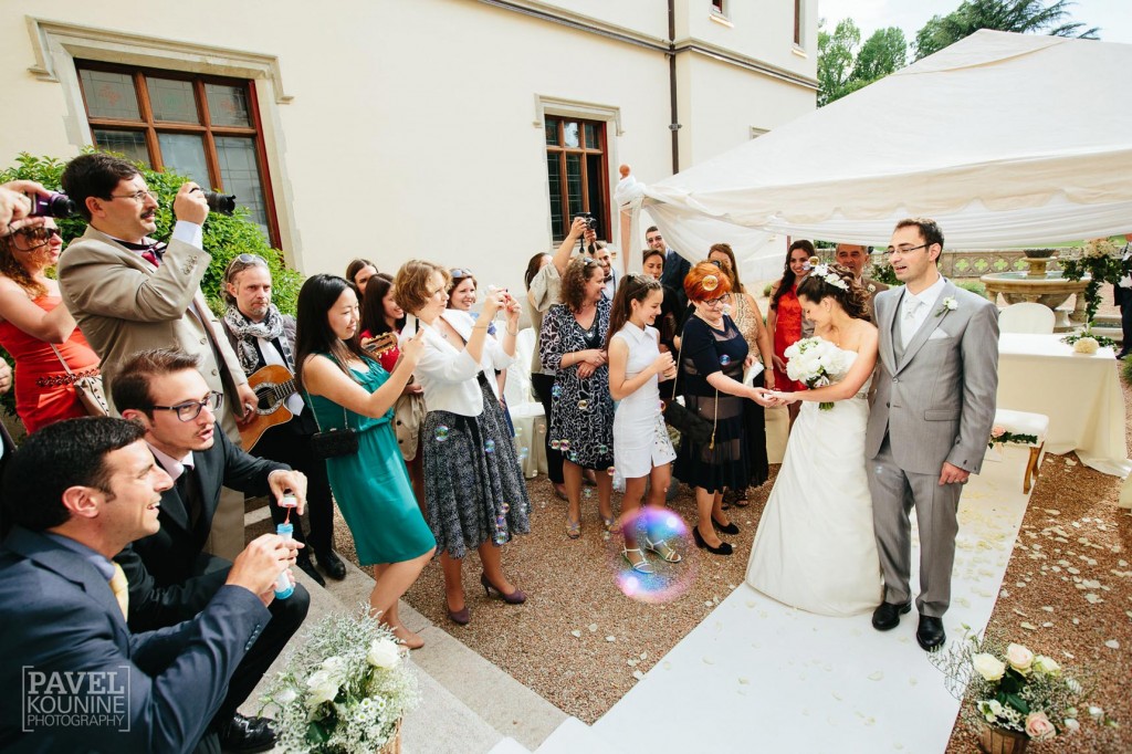 Intimate wedding photography: bride and groom pose for photography