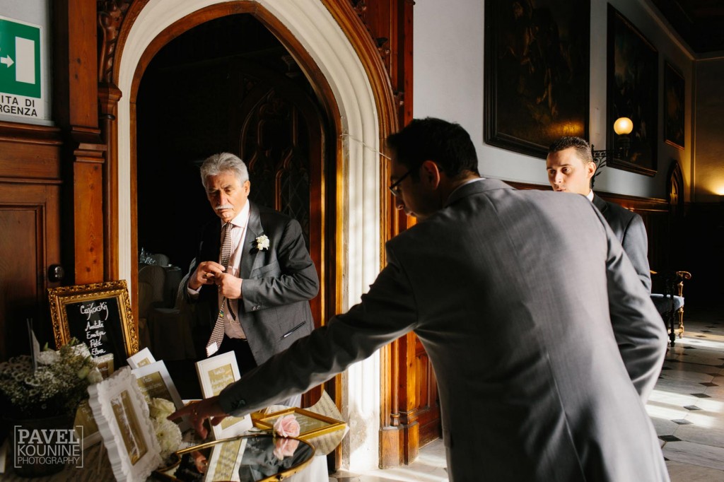 Intimate wedding photography: groom and father