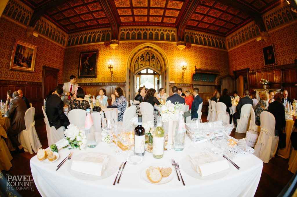 Intimate wedding photography: wide view of the dining hall